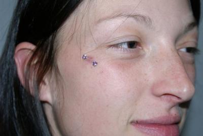 Piercing - piercings pommettes - Piercing pommette . Boutique Tattoo Evolution Perpignan